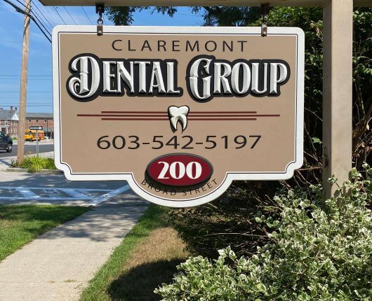 Dentistry name and phone number on the signboard