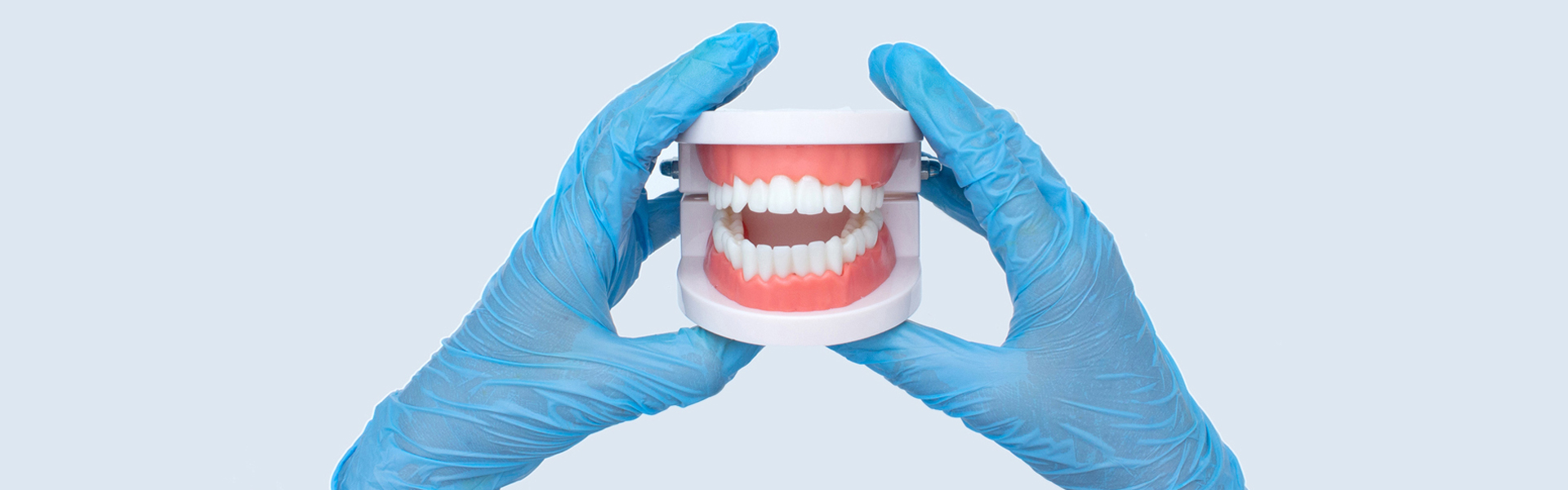 What is the difference between an overdenture and an immediate denture?
